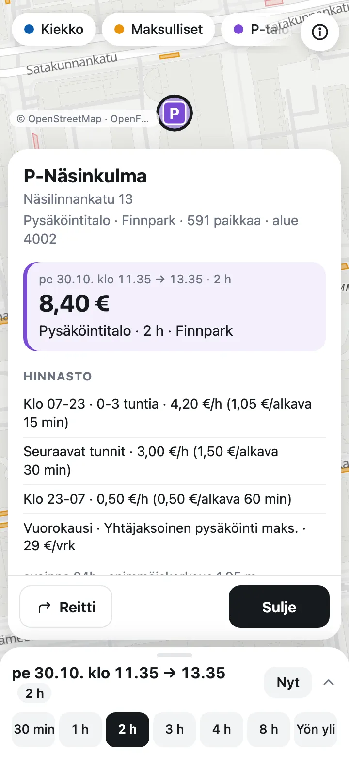 A parking garage with the price for a two-hour stay and its price list.